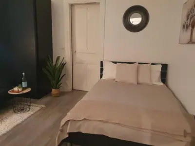 Un ou plusieurs lits dans un hébergement de l'établissement Modern and cozy studio 2 minutes from Porte d'Orléans