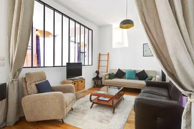 Coin salon dans l'établissement Apartment in le marais