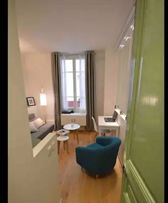 Coin salon dans l'établissement Paris apartment with room near Tour Eiffel