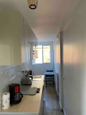 Cuisine ou kitchenette dans l'établissement Paris apartment with room near Tour Eiffel