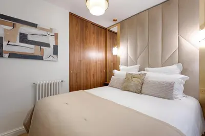 Un ou plusieurs lits dans un hébergement de l'établissement Serviced Apartment - 6 Guests - Champs-Élysées