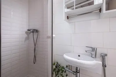 Salle de bains dans l'établissement Charmant studio au cœur du 16ᵉ