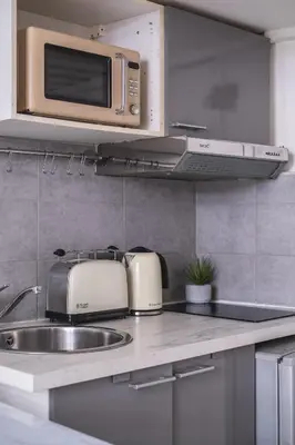 Cuisine ou kitchenette dans l'établissement Charmant studio au cœur du 16ᵉ