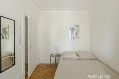 Un ou plusieurs lits dans un hébergement de l'établissement Flexliving - whole house - Gabriel Peri