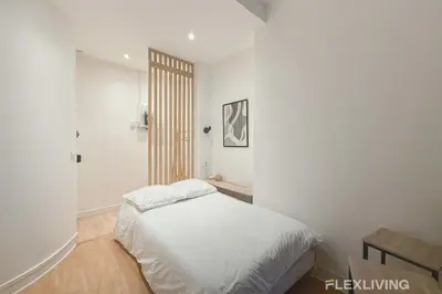 Un ou plusieurs lits dans un hébergement de l'établissement Studio Moderne Paris Centre - Near Opéra & Lafayette