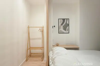 Un ou plusieurs lits dans un hébergement de l'établissement Studio Moderne Paris Centre - Near Opéra & Lafayette