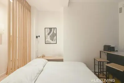 Un ou plusieurs lits dans un hébergement de l'établissement Studio Moderne Paris Centre - Near Opéra & Lafayette