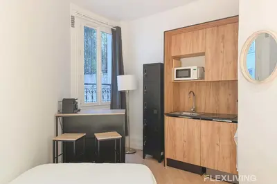 Cuisine ou kitchenette dans l'établissement Studio Moderne Paris Centre - Near Opéra & Lafayette