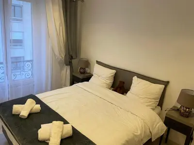 Un ou plusieurs lits dans un hébergement de l'établissement Paris Arc de Triomphe- Tour Eiffel - Champs Élysées - 4 people