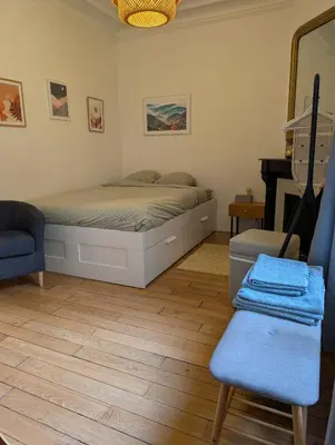 Un ou plusieurs lits dans un hébergement de l'établissement Apartment 2 steps from Montmartre