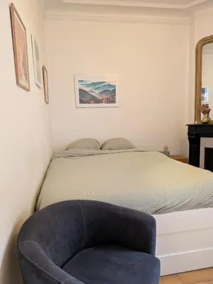 Un ou plusieurs lits dans un hébergement de l'établissement Apartment 2 steps from Montmartre