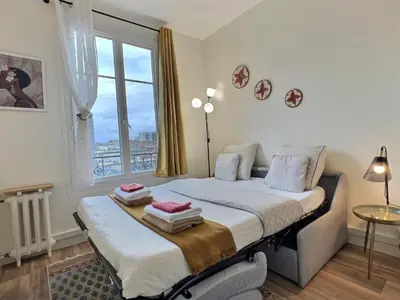 Un ou plusieurs lits dans un hébergement de l'établissement Studio Paris 14ièm-Montrouge