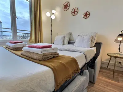 Un ou plusieurs lits dans un hébergement de l'établissement Studio Paris 14ièm-Montrouge