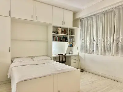 Un ou plusieurs lits dans un hébergement de l'établissement Small Cosy Studio in Paris