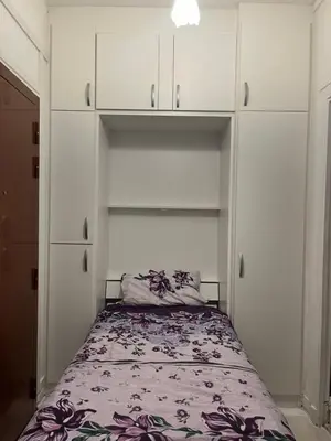Un ou plusieurs lits dans un hébergement de l'établissement Small Cosy Studio in Paris