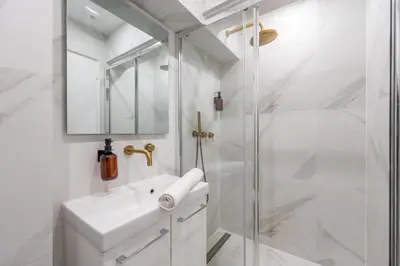 Salle de bains dans l'établissement Nouveau Appartement Sacré Cœur Cottages 4