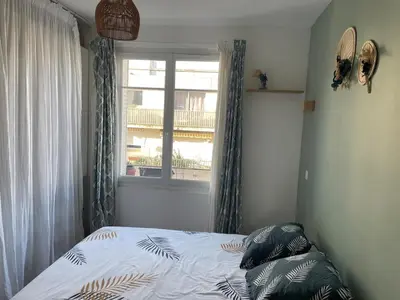 Un ou plusieurs lits dans un hébergement de l'établissement Appartment T2 Asnières Gare
