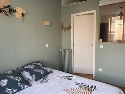 Un ou plusieurs lits dans un hébergement de l'établissement Appartment T2 Asnières Gare
