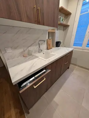Cuisine ou kitchenette dans l'établissement Appartment T2 Asnières Gare