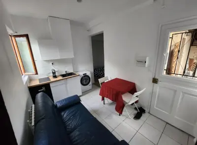 Coin salon dans l'établissement Appartement 2 pieces agréable lumineux et calme
