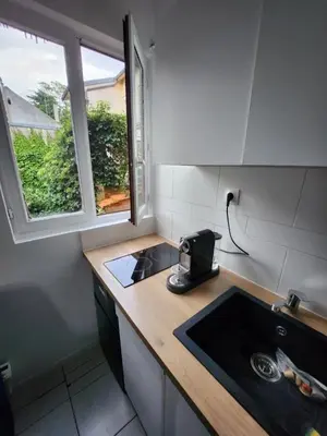 Cuisine ou kitchenette dans l'établissement Appartement 2 pieces agréable lumineux et calme