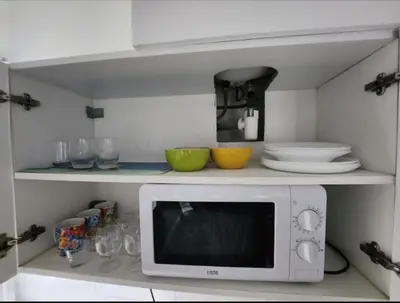 Cuisine ou kitchenette dans l'établissement Appartement 2 pieces agréable lumineux et calme