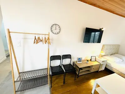 Un ou plusieurs lits dans un hébergement de l'établissement Appartement porte de Saint Ouen