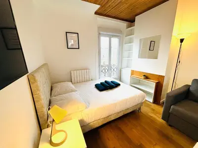 Un ou plusieurs lits dans un hébergement de l'établissement Appartement porte de Saint Ouen