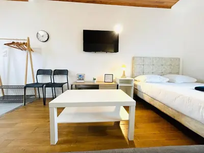 Un ou plusieurs lits dans un hébergement de l'établissement Appartement porte de Saint Ouen