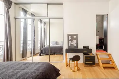 Un ou plusieurs lits dans un hébergement de l'établissement Chic Stay near Louvre & Eiffel Tour