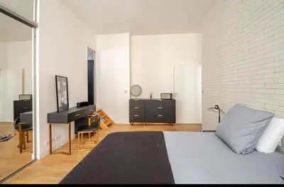Un ou plusieurs lits dans un hébergement de l'établissement Chic Stay near Louvre & Eiffel Tour
