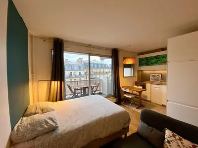Un ou plusieurs lits dans un hébergement de l'établissement Appartement Censier Monge