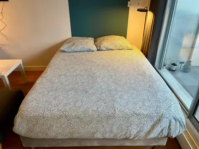 Un ou plusieurs lits dans un hébergement de l'établissement Appartement Censier Monge