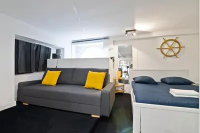 Coin salon dans l'établissement Superb Apartment Quartier Bonne Nouvelle Free Netflix