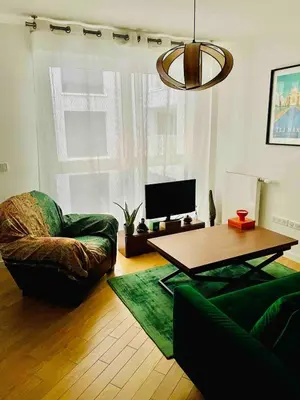 Coin salon dans l'établissement Paris, la plus belle ville du monde!