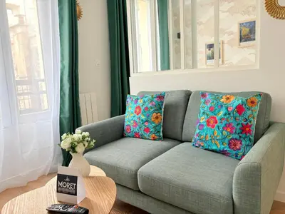 Coin salon dans l'établissement Moret Art Flats Trendy East Paris