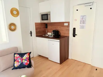 Cuisine ou kitchenette dans l'établissement Moret Art Flats Trendy East Paris