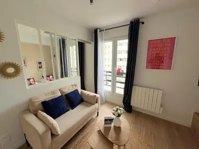 Coin salon dans l'établissement Moret Art Flats Trendy East Paris
