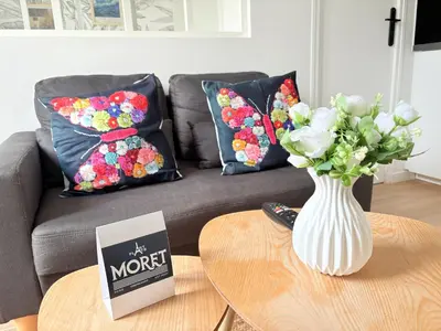 Coin salon dans l'établissement Moret Art Flats Trendy East Paris