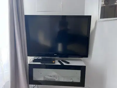 Télévision ou salle de divertissement dans l'établissement Paris Saint-Paul