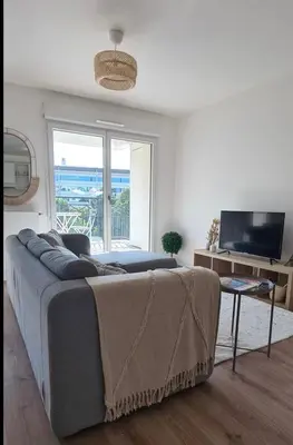 Télévision ou salle de divertissement dans l'établissement Le Central - Bel appartement lumineux proche Paris