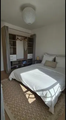 Un ou plusieurs lits dans un hébergement de l'établissement Le Central - Bel appartement lumineux proche Paris