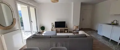Télévision ou salle de divertissement dans l'établissement Le Central - Bel appartement lumineux proche Paris