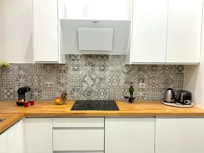 Cuisine ou kitchenette dans l'établissement L'appartement Murat