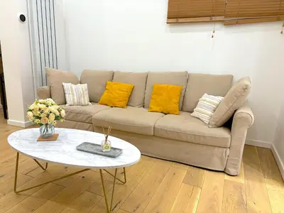 Coin salon dans l'établissement L'appartement Murat