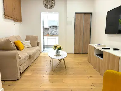 Coin salon dans l'établissement L'appartement Murat