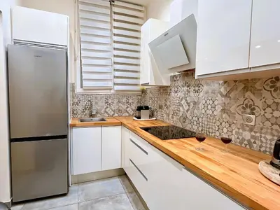 Cuisine ou kitchenette dans l'établissement L'appartement Murat
