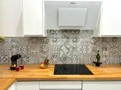 Cuisine ou kitchenette dans l'établissement L'appartement Murat
