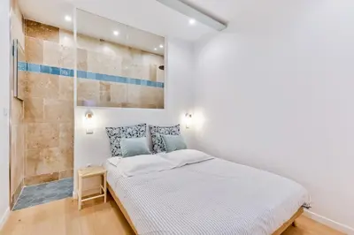 Un ou plusieurs lits dans un hébergement de l'établissement Apt 1BDR 4PAX - Bastille