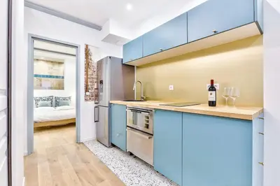 Cuisine ou kitchenette dans l'établissement Apt 1BDR 4PAX - Bastille